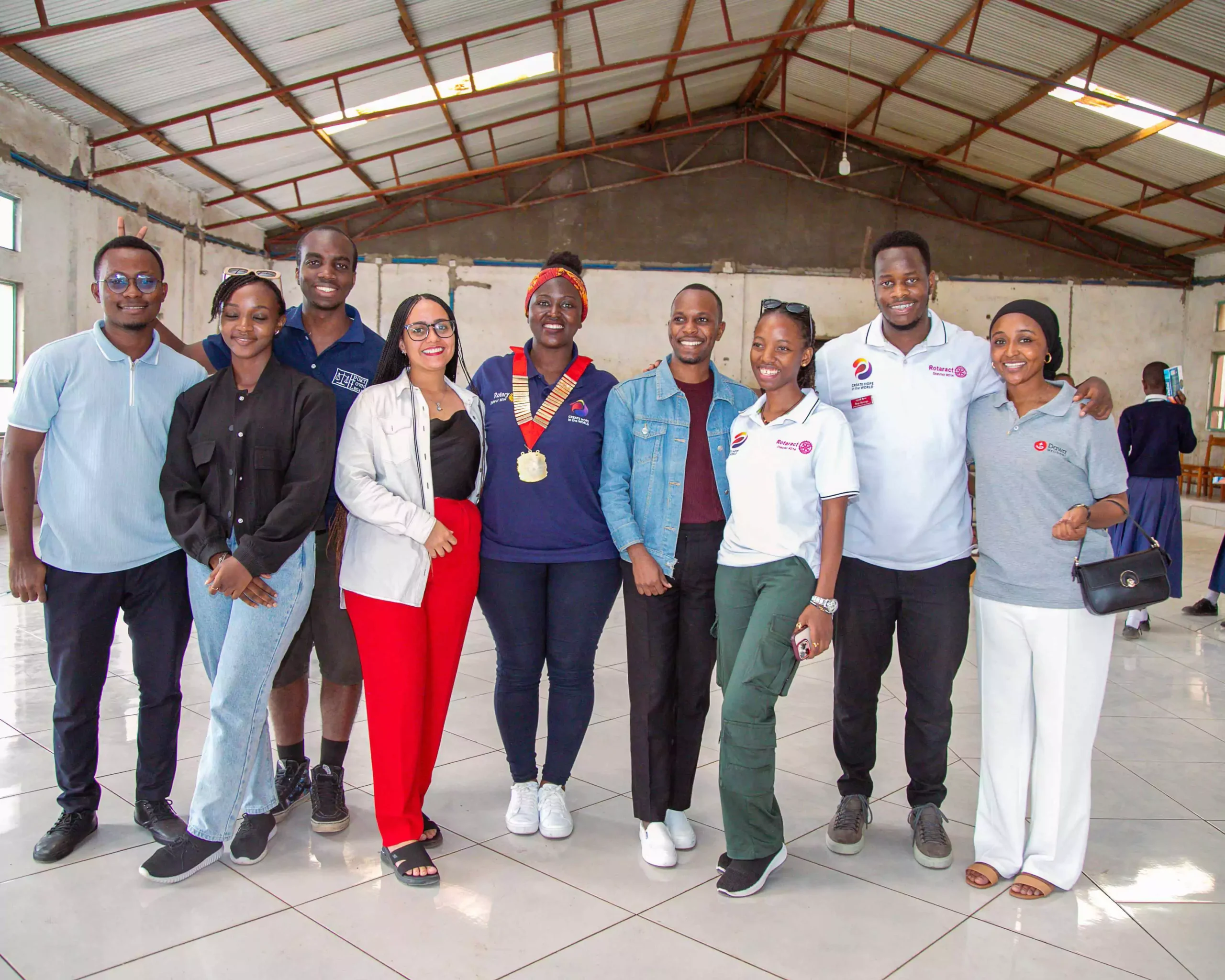 Upendo Kwanza board members and volunteers at Kisimiri school