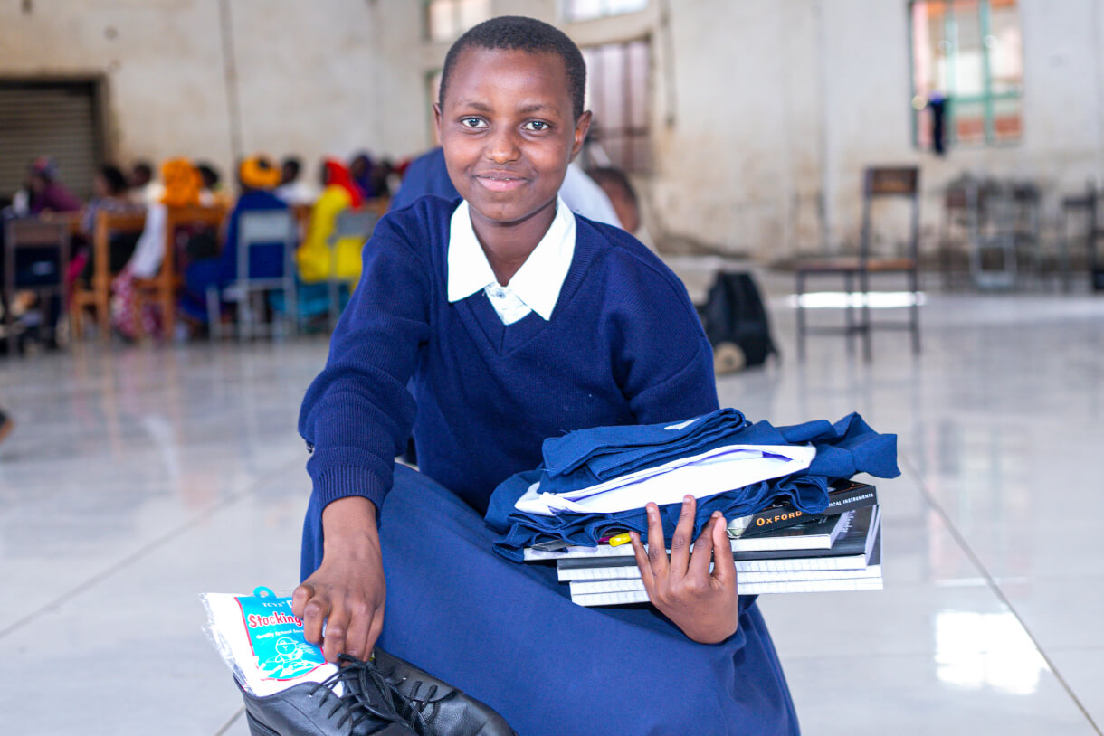 girl with books and shoes